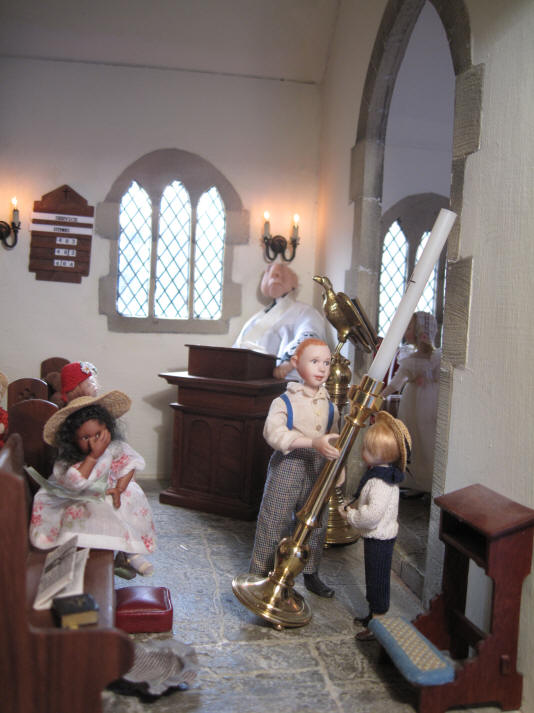 Ah........Grace is worried that Ambrose and Tom won't manage to move the paschal candle out of the church and it looks dangerously close to falling over......HELP!