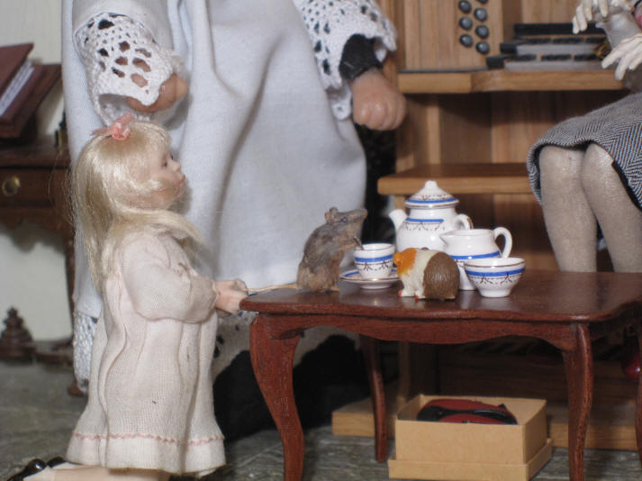 Sepp is so relieved that the teaspoon is now found and is enjoying giving Miss Enid's cup of tea a good stir after putting one and half teaspoons of sugar in it for her!